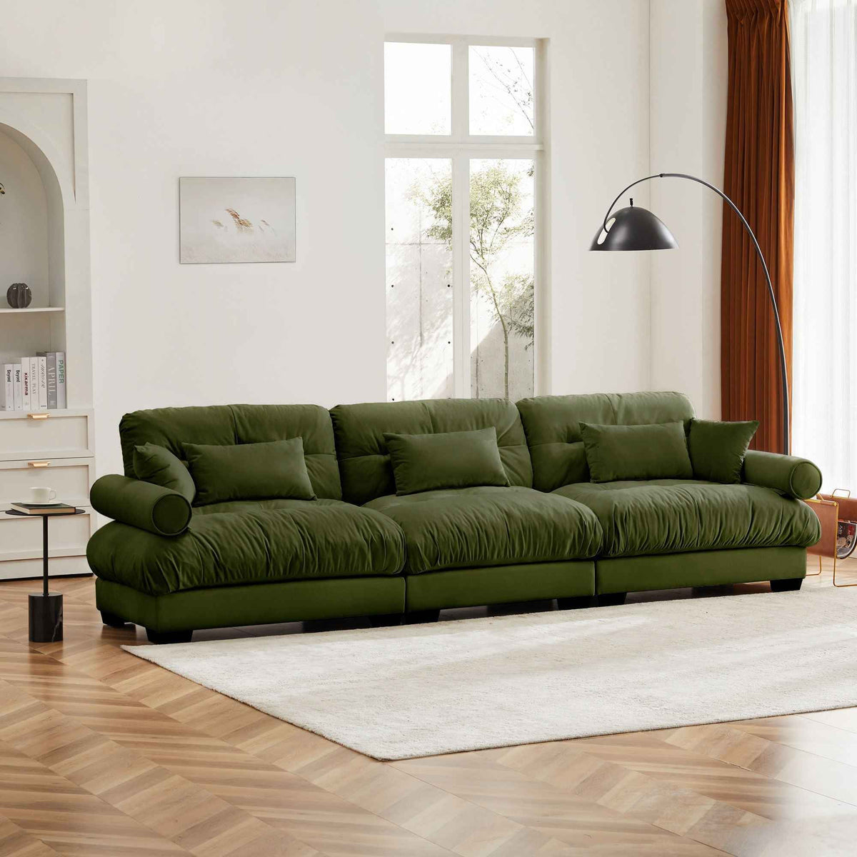 Modern Sofa With Bolstered Armrests And Pillows