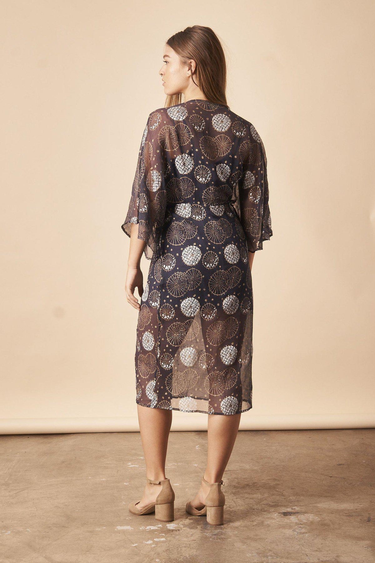 Dancing Umbrellas Twisted Midi Dress in Navy + Metallic