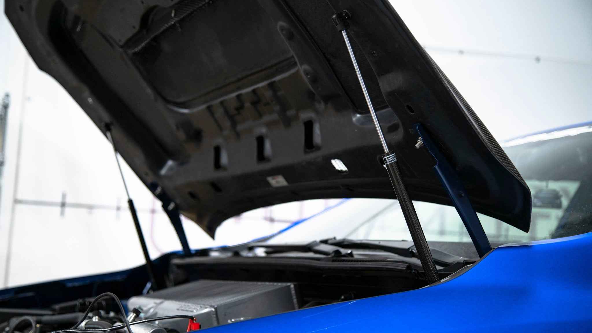 OLM Carbon Fiber Wrapped Hood Struts - 2022+ WRX