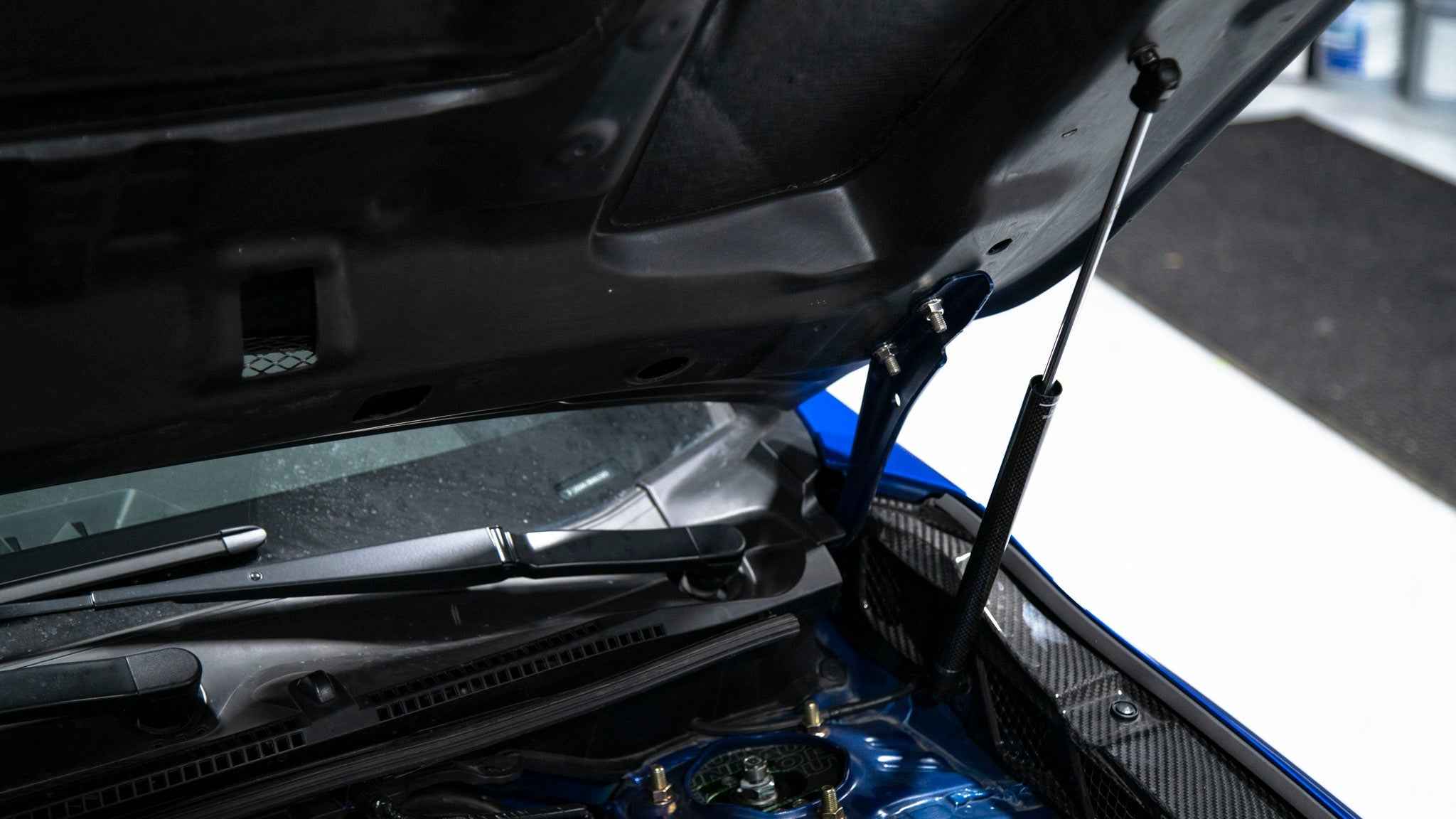 OLM Carbon Fiber Wrapped Hood Struts - 2022+ WRX