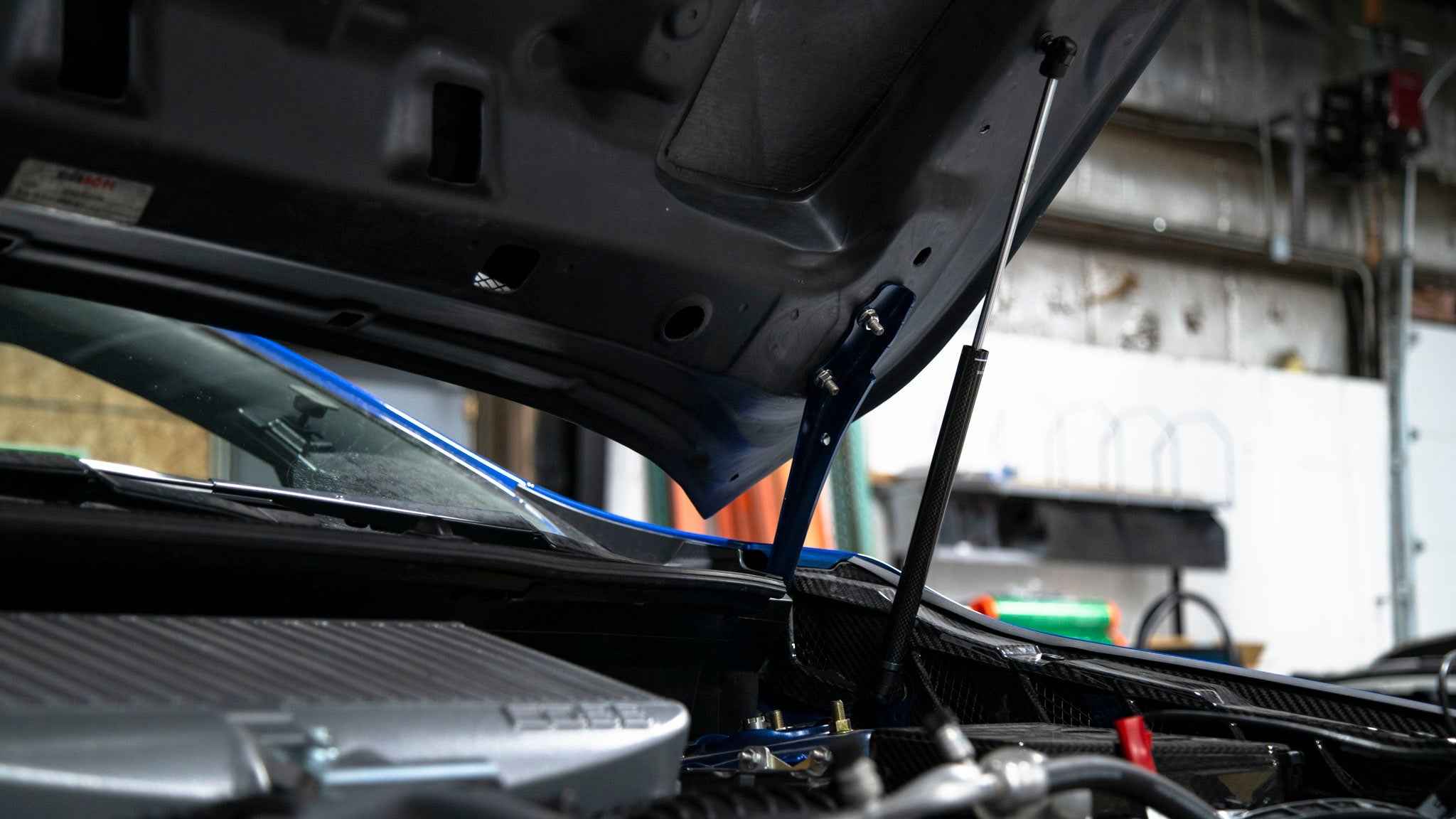 OLM Carbon Fiber Wrapped Hood Struts - 2022+ WRX