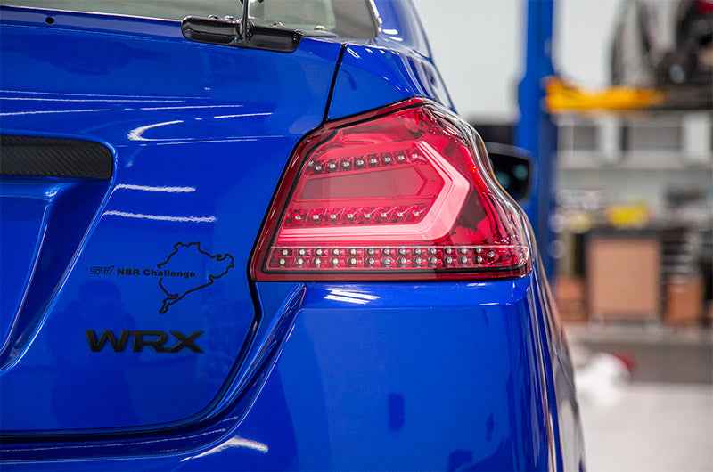 OLM Evolution Tail Lights - Clear Lens, Red Base, White Bar - 2015-2021 Subaru WRX / STI