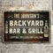 Backyard Bar And Grill Sign