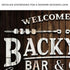 Welcome To Our Backyard Bar And Grill Sign