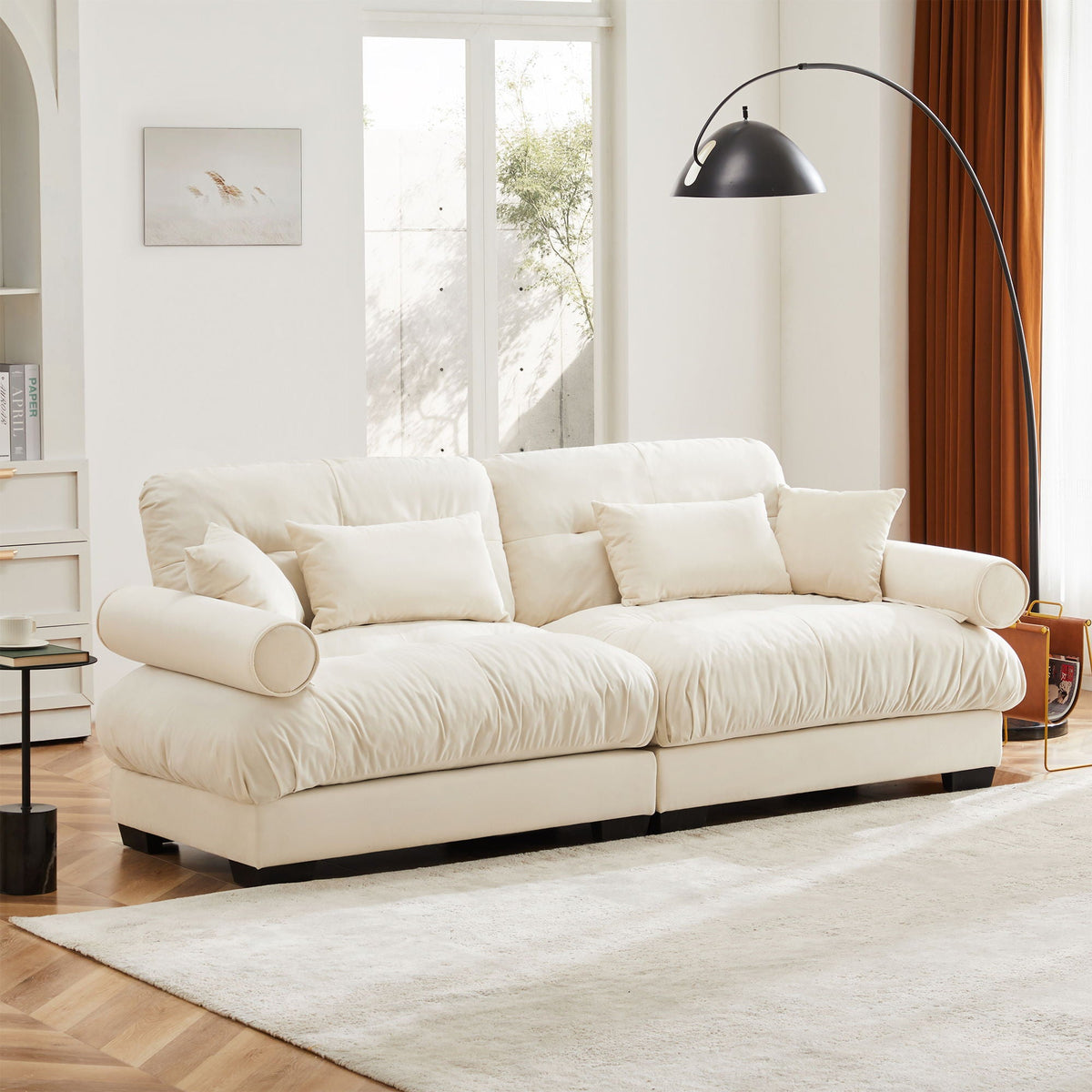 Modern Sofa With Bolstered Armrests And Pillows