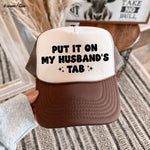 Put It On My Husband's Tab Trucker Hat *12 Colors