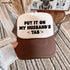 Put It On My Husband's Tab Trucker Hat *12 Colors