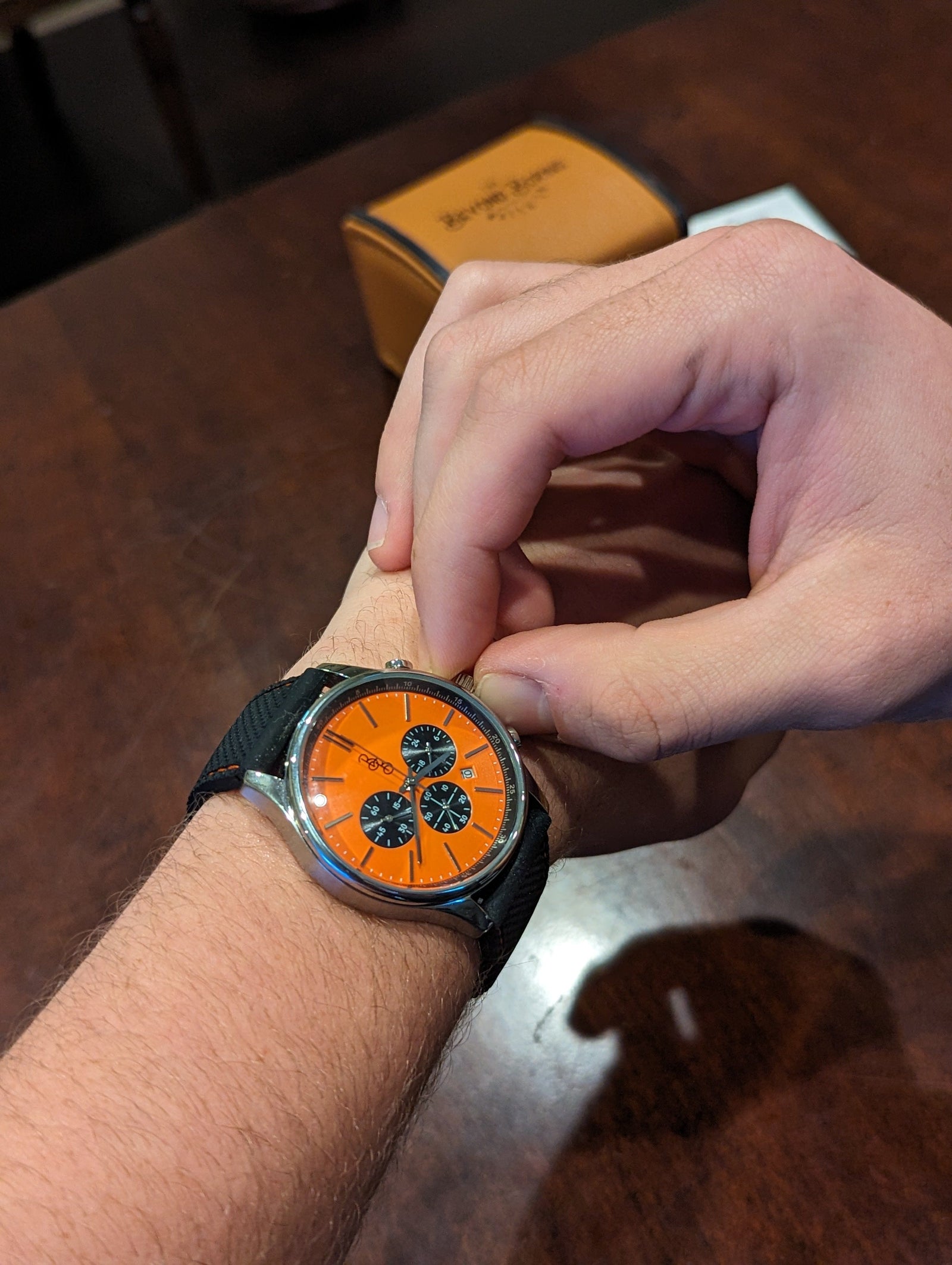 Orange and Black Chronograph Watch